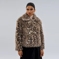 Women's leopard print polyester coat with a buckle lapel closure on a hanger