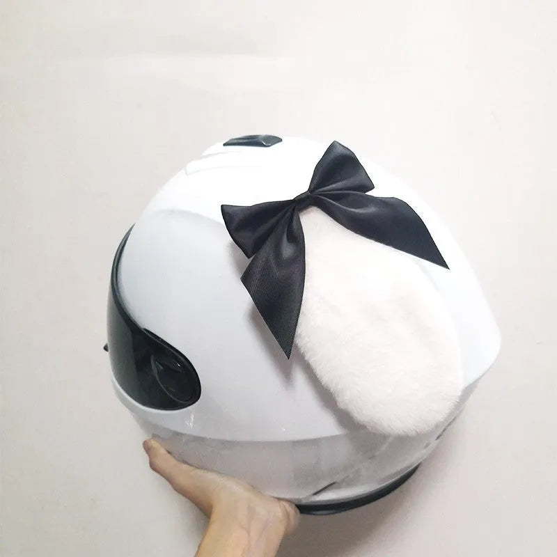 Carbon fibre rabbit ears motorcycle helmet decoration in multiple colours on a black helmet.