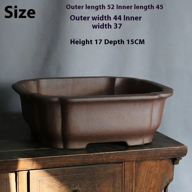 A rectangular purple sand ceramic bonsai flower pot with a modern minimalist design.