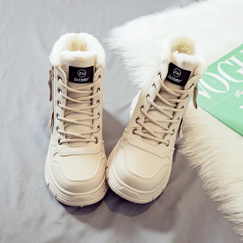 Plus size women's lace-up snow boots with fleece lining and a rubber sole.
