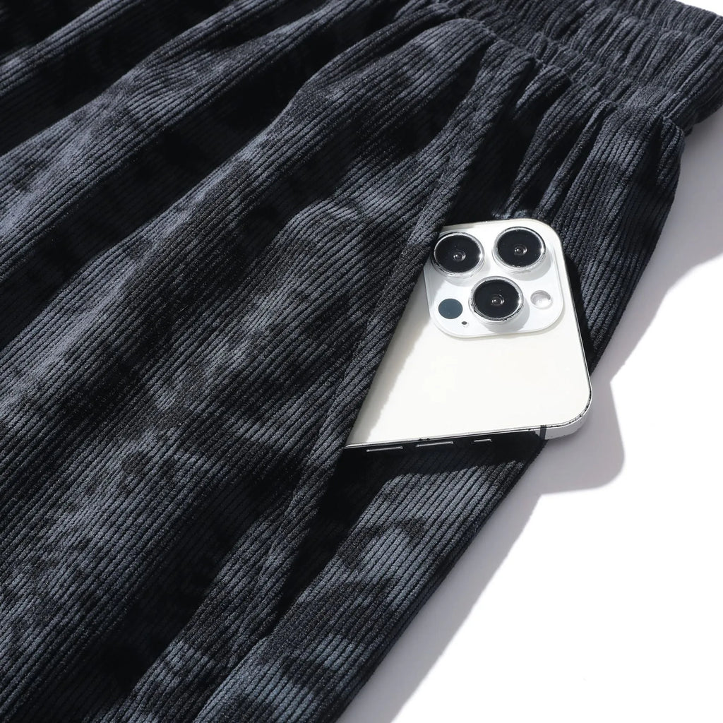 Men's corduroy camouflage shorts with high waist and straight leg cut in black, gray, and white colours