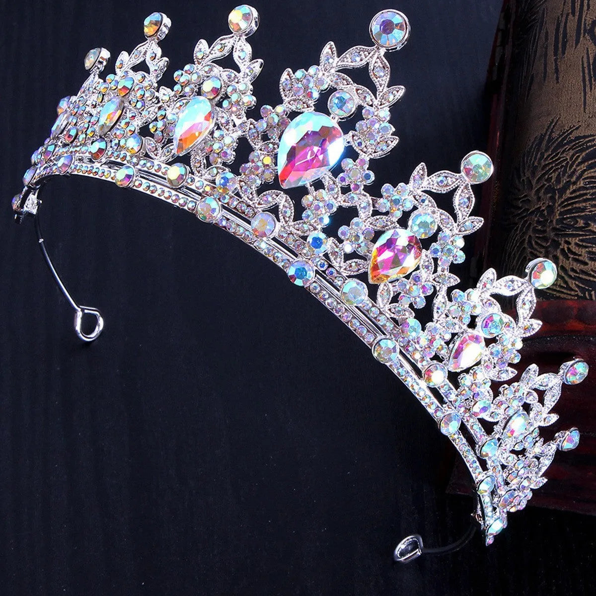 Gold alloy crown-shaped wedding hair headdress with electroplated finish on neutral background