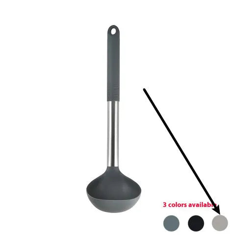 Black silicone kitchen utensil set with 12 tools stored in a rotating plastic storage bucket on a worktop.