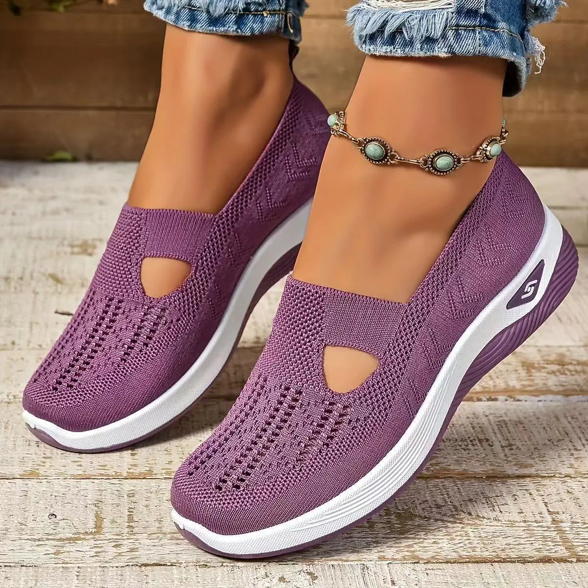 Casual mesh walking shoes with T-strap in multiple colours on a soft PVC sole.