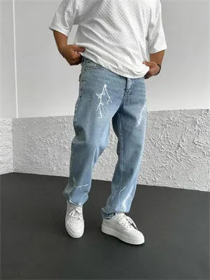 Men's blue straight-leg jeans with loose wide-leg fit and mid-rise waist