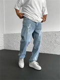 Men's blue straight-leg jeans with loose wide-leg fit and mid-rise waist