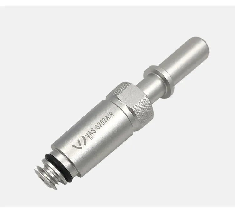 Silver metal VAS6262-9 transmission refuelling joint tool on a workshop bench.