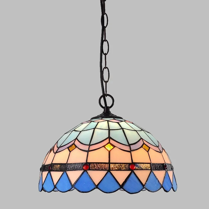 European retro baroque style chandelier in coloured glaze with abstract modelling.