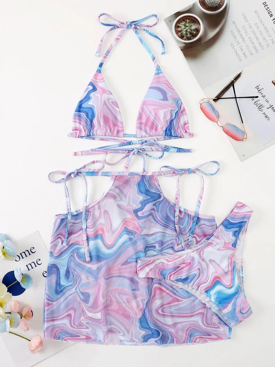 Lavender three-piece bikini set with beach skirt for women, shown in sizes S M L