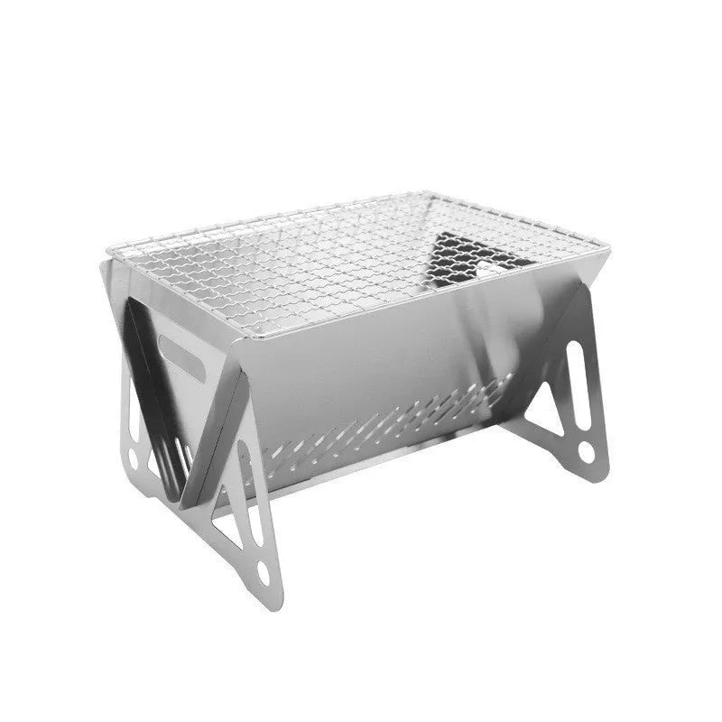 Folding stainless steel outdoor barbecue grill oven with large cooking rack, shown with storage bag.