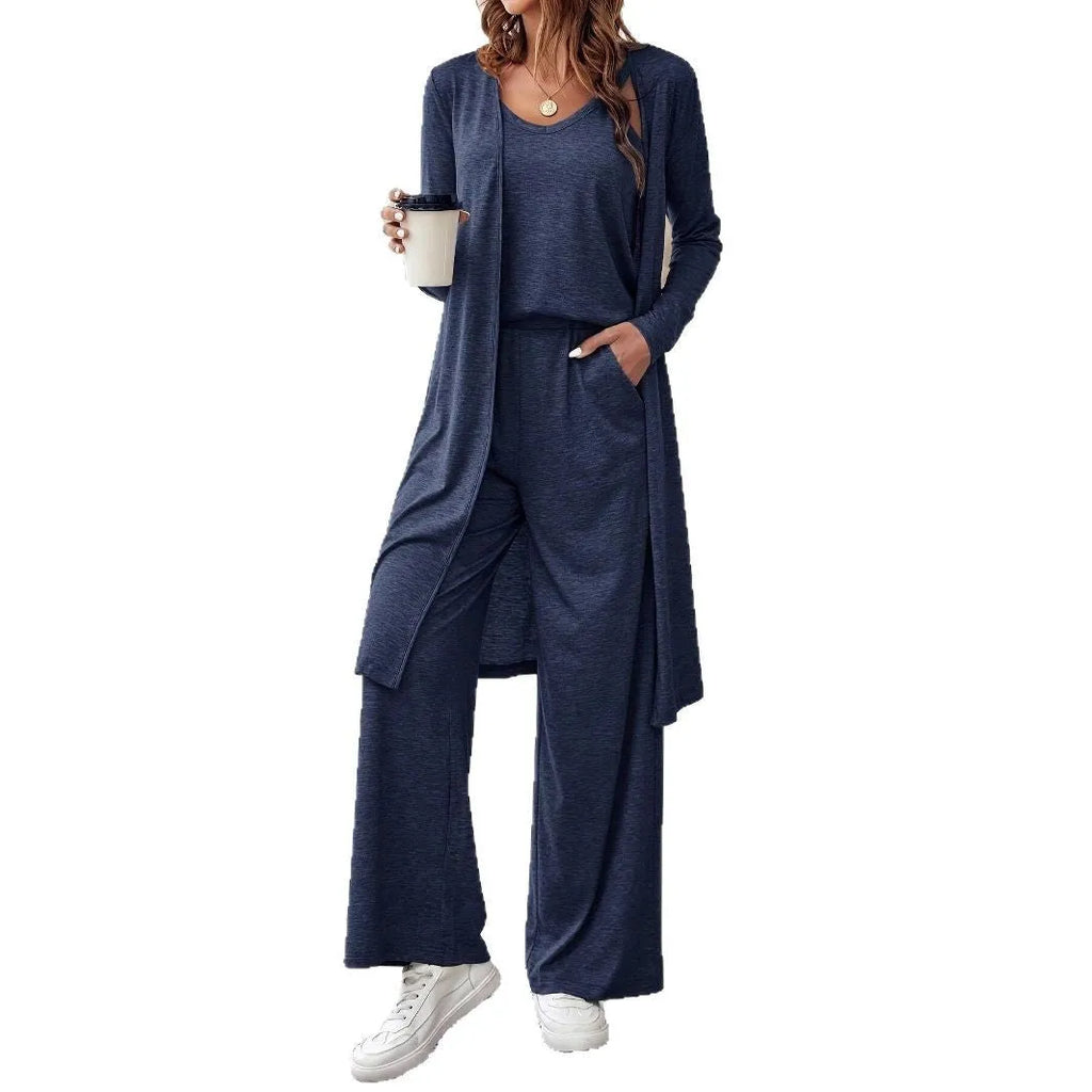 Blue women's three-piece casual suit set with sling top, cardigan, trousers, and suspenders.