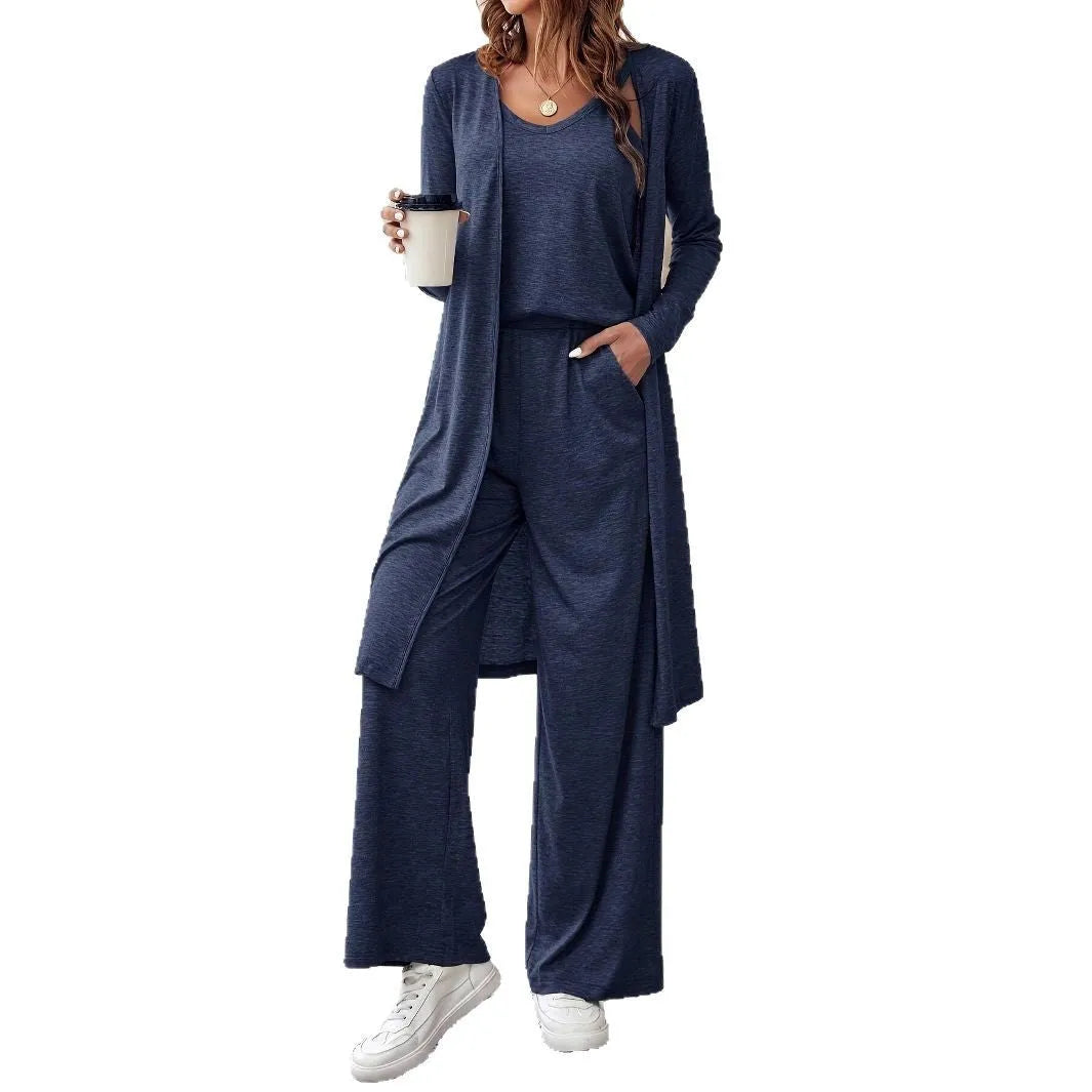 Blue women's three-piece casual suit set with sling top, cardigan, trousers, and suspenders.