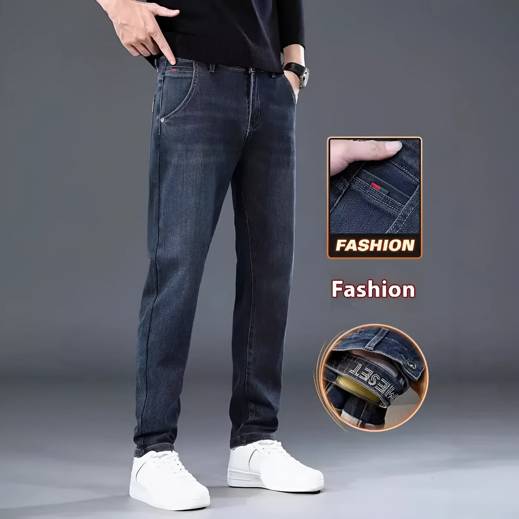 Men's slim straight casual trousers in blue grey, showing loose fit and street style.