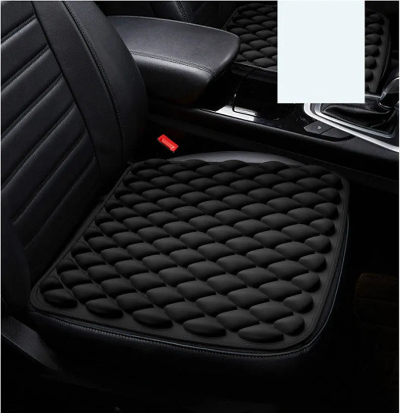 The Pressure Relief Seat Breathes polyester fiber cushion 45x45cm in beige on a chair
