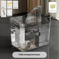 Automatic cat water fountain with filter in transparent plastic, showing water flow.