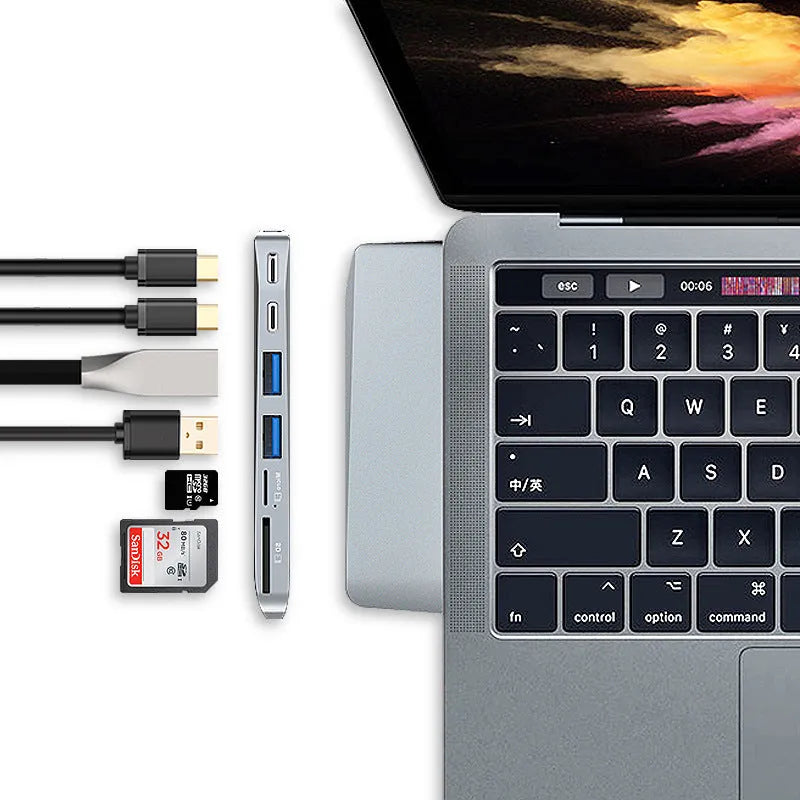 8-in-1 card reader hub for MacBook Pro with dual USB-C plugs and multiple expansion ports