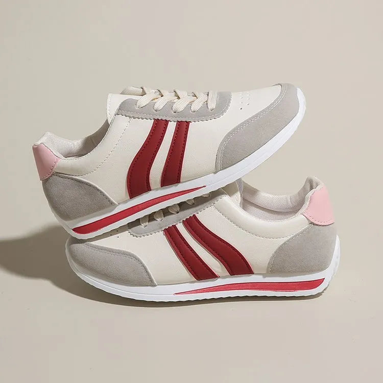 Red and blue lace-up leisure sneakers with soft rubber soles and mesh upper