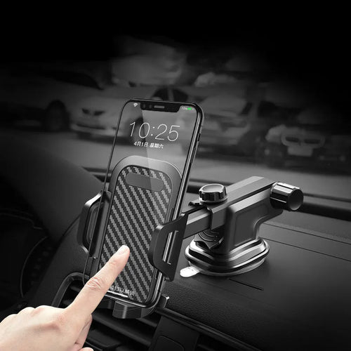 Black universal adjustable car phone holder mounted on a car air vent, showing EVA foam lining inside the cradle.