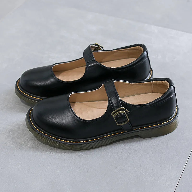 Women's solid colour round toe low-cut flat retro shoes with buckle closure in black