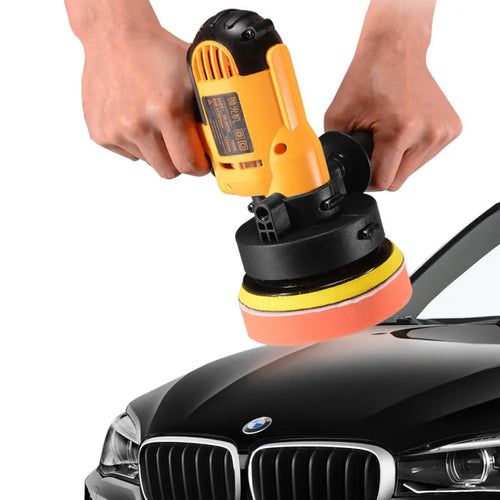 Yellow automotive polishing machine with 125mm disc diameter on workbench