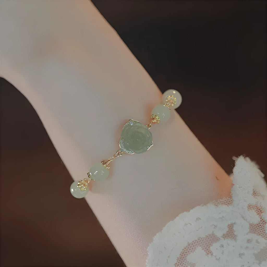 Original national-style women's bracelet with Hetian jade rose motifs and 14K gilded accents