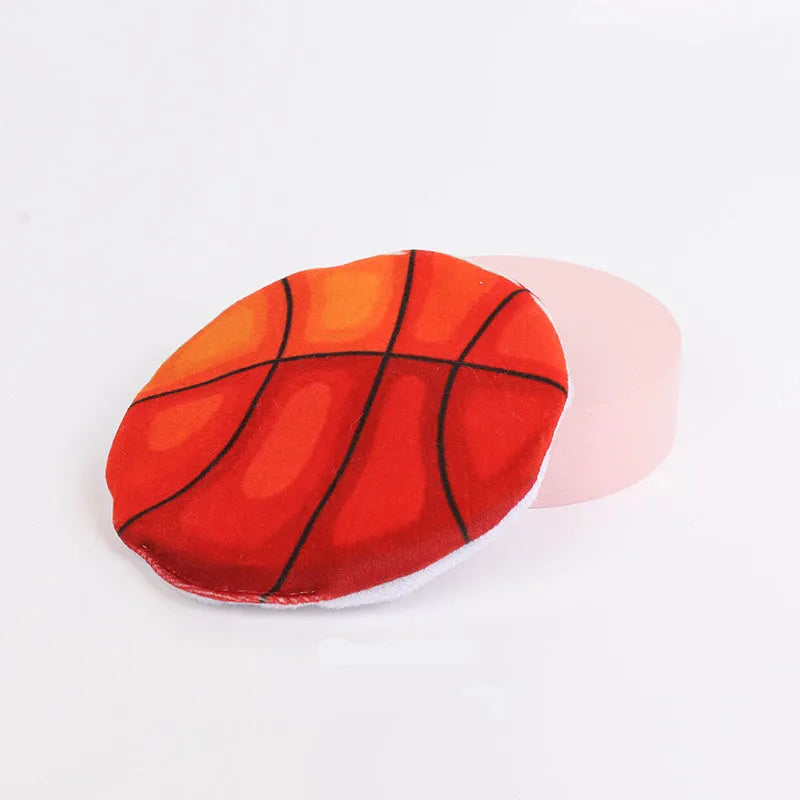 Flying disc shaped plush cat toy with sports ball pattern, containing catnip and crinkle sound.
