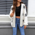 Beige plus-size women's cardigan with white Jacquard flower pattern, loose fit and off-neck design.