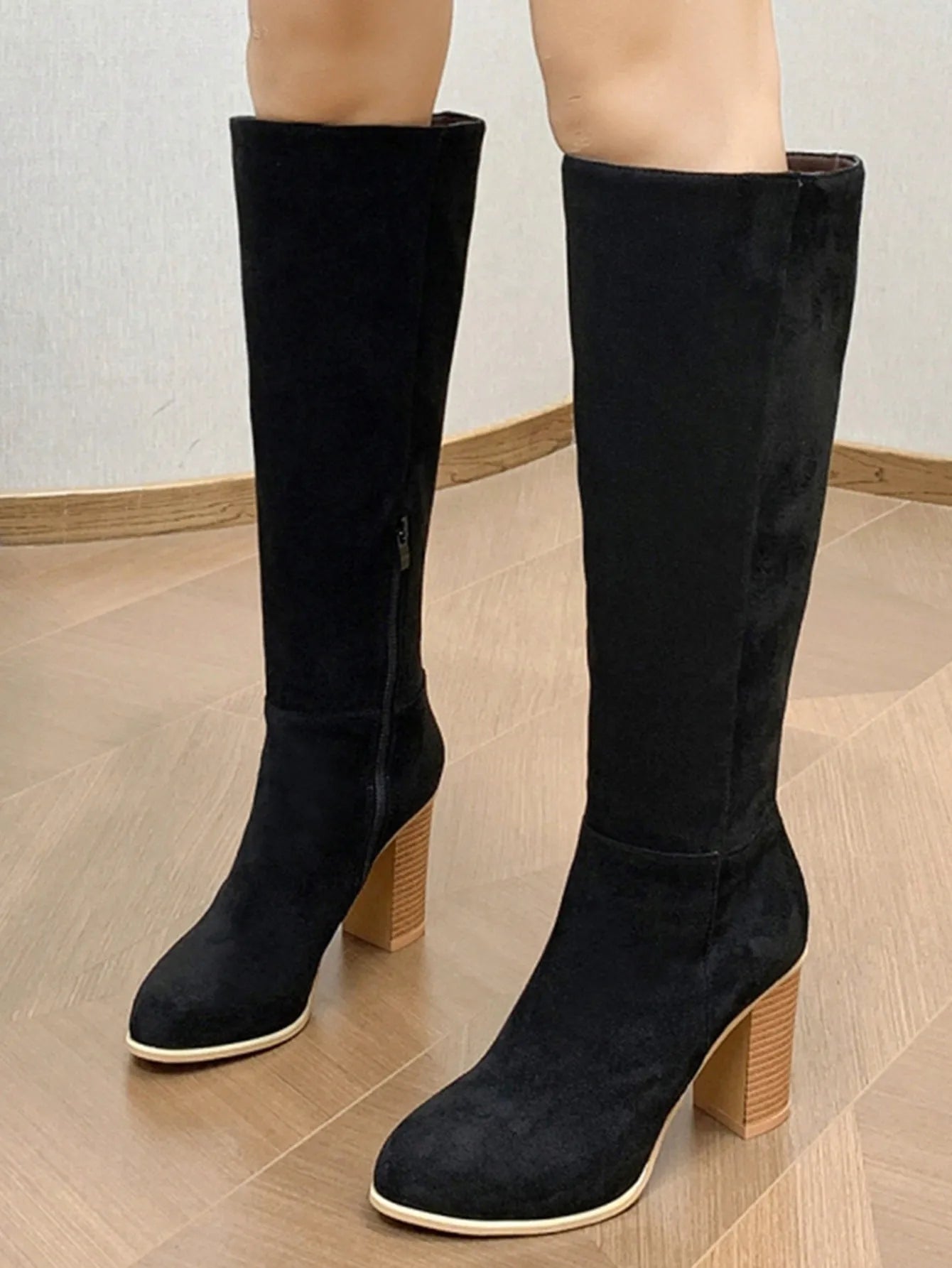 Women's square toe high heel fashion boots in black and dark brown colours showing front view