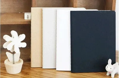 Retro graffiti book with solid colour cover in four options: black, white, cowhide colour and grey
