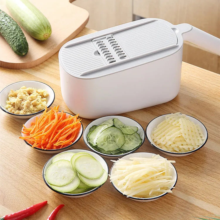 Nordic style multifunctional vegetable cutter with stainless steel blades in blue colour.
