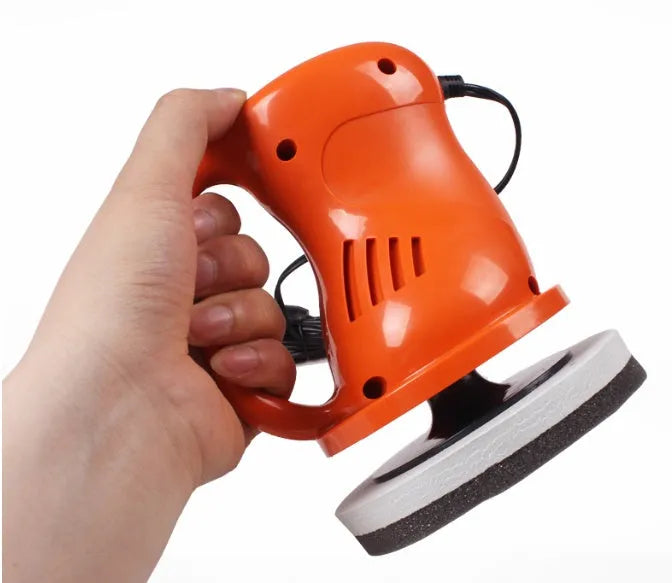 12V car polishing machine with ergonomic handle, thick cigarette lighter cord, black and orange colours