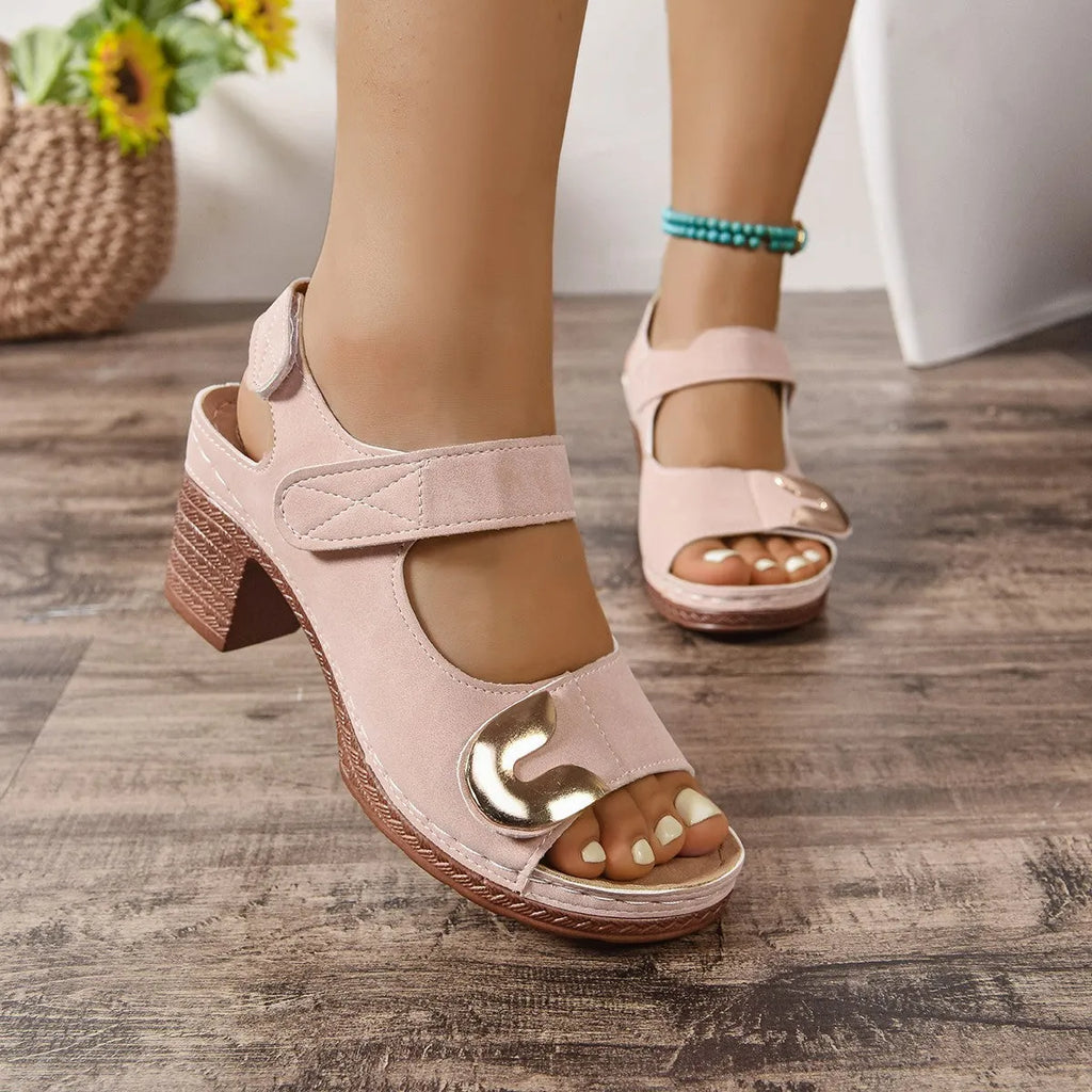 Adjustable Velcro Roman sandal with round toe in light brown colour on a white background.