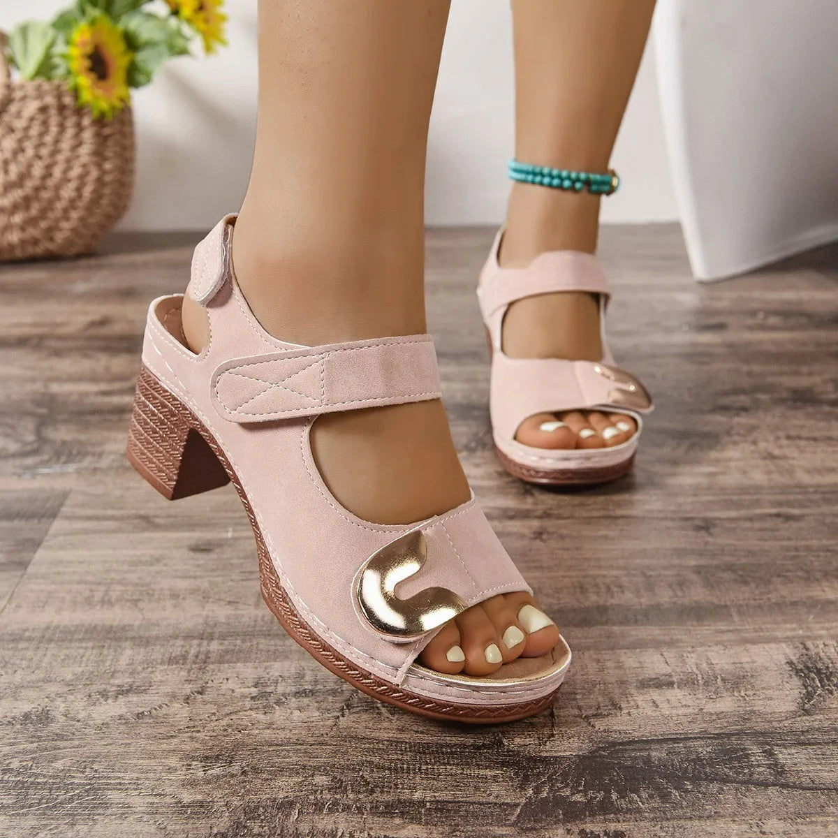 Adjustable Velcro Roman sandal with round toe in light brown colour on a white background.