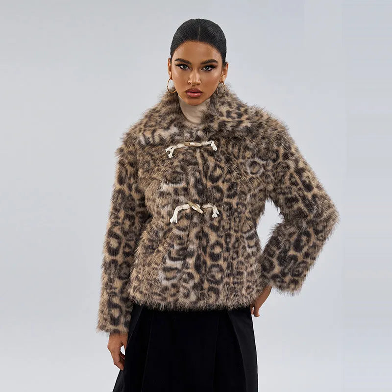 Women's leopard print polyester coat with a buckle lapel closure on a hanger