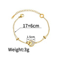 Women's adjustable stainless steel bracelet with a double-layered resin heart charm.