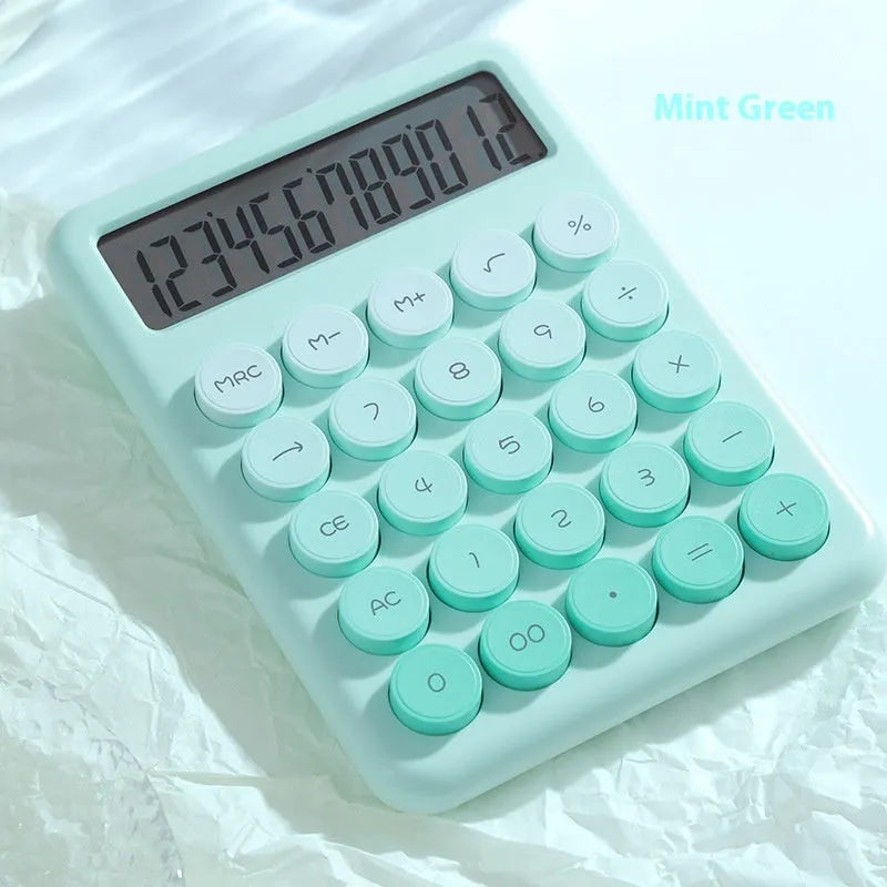 Gradient colour desk calculator in violet, cherry blossom pink, light blue or mint green.