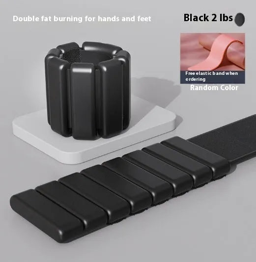 Silicone and Velcro fitness bracelet with detachable 1lb or 2lb weight on a wrist.