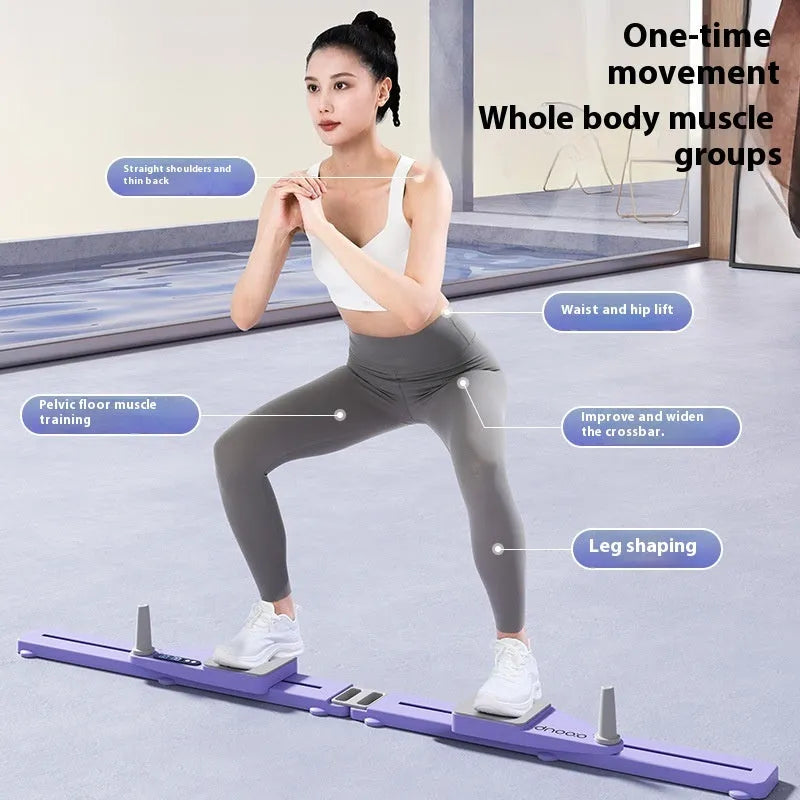 Purple and pink split skiing machine trainer on a wooden floor, showing 85cm sliding rail and foot pedals.