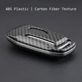 Plastic protective shell for a car key remote, shown in single shell and buckle design options.