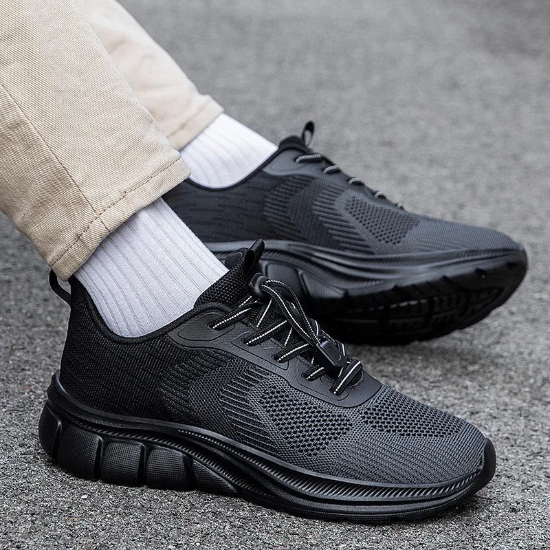 Knitted casual unisex sports shoes in solid colour with Flyknit upper and low flat heel