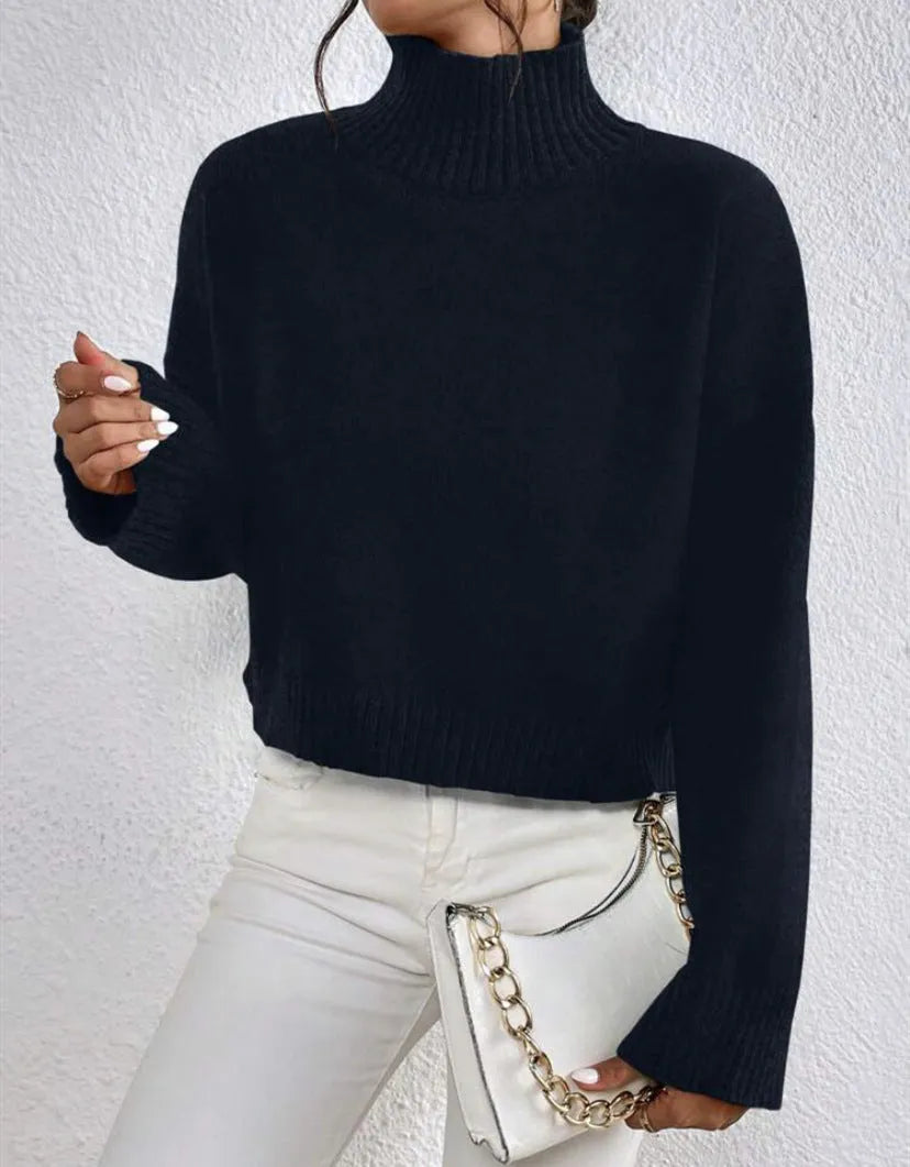 Loose versatile basic women's pullover in gray, showing thread texture and relaxed fit