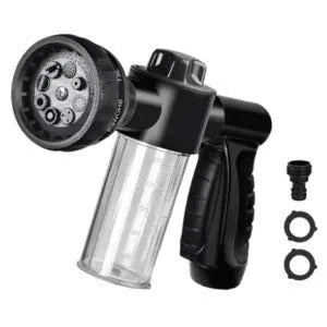 Green high-pressure foam spray gun with adjustable nozzle and attached water hose for car and garden cleaning.