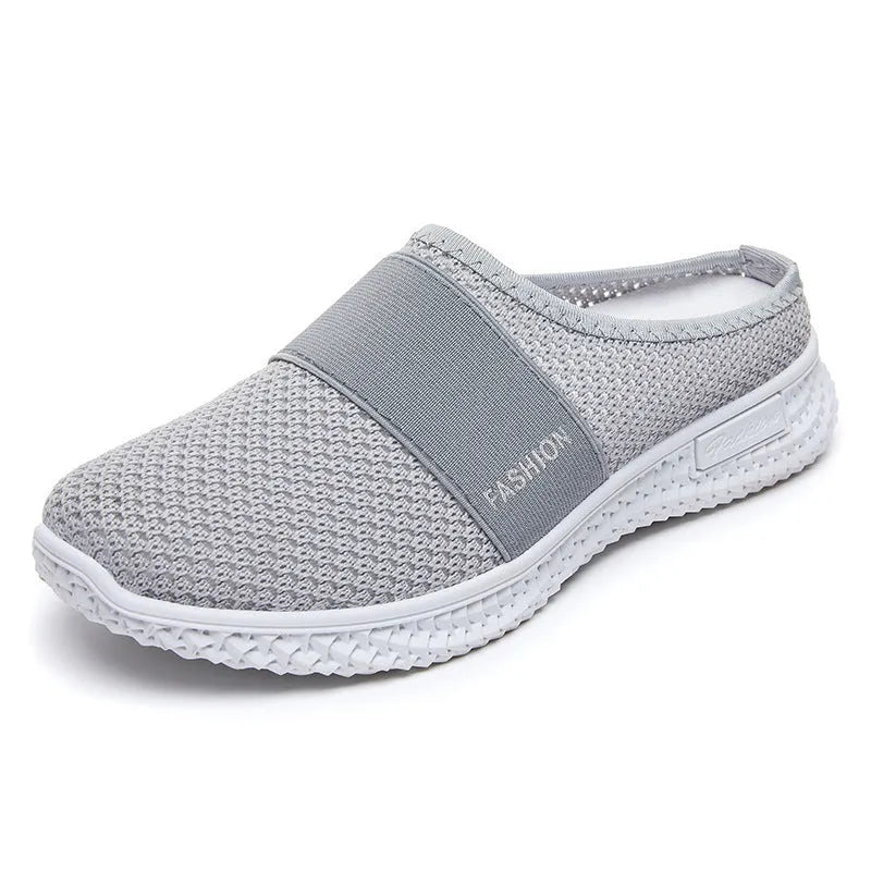 Women's mesh casual shoes with hollow-out design and flat heel in black colour