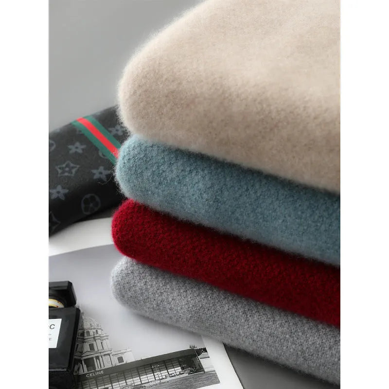 Men's slim fit half zip wool sweater in grey, showing round neck and regular sleeves.