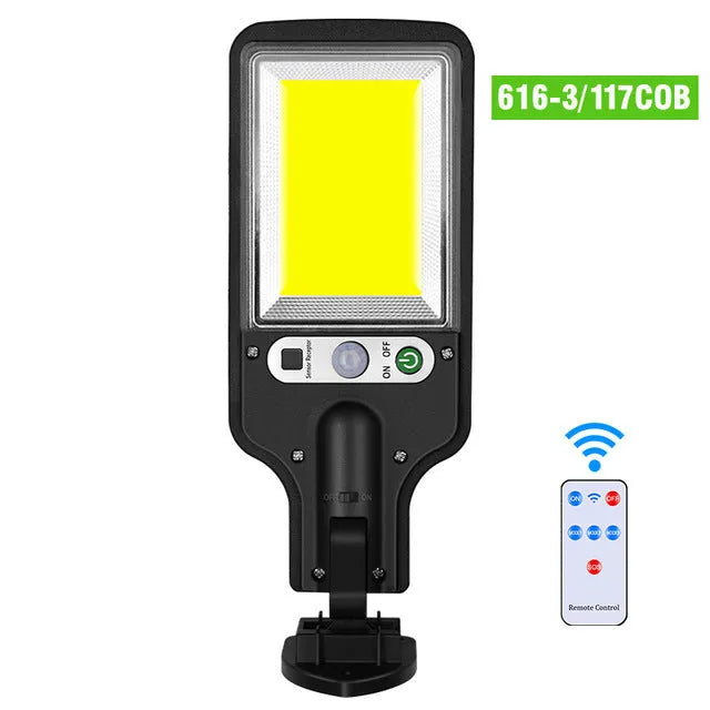 Outdoor solar LED wall lamp 28LED variant mounted on a garden fence for patio lighting