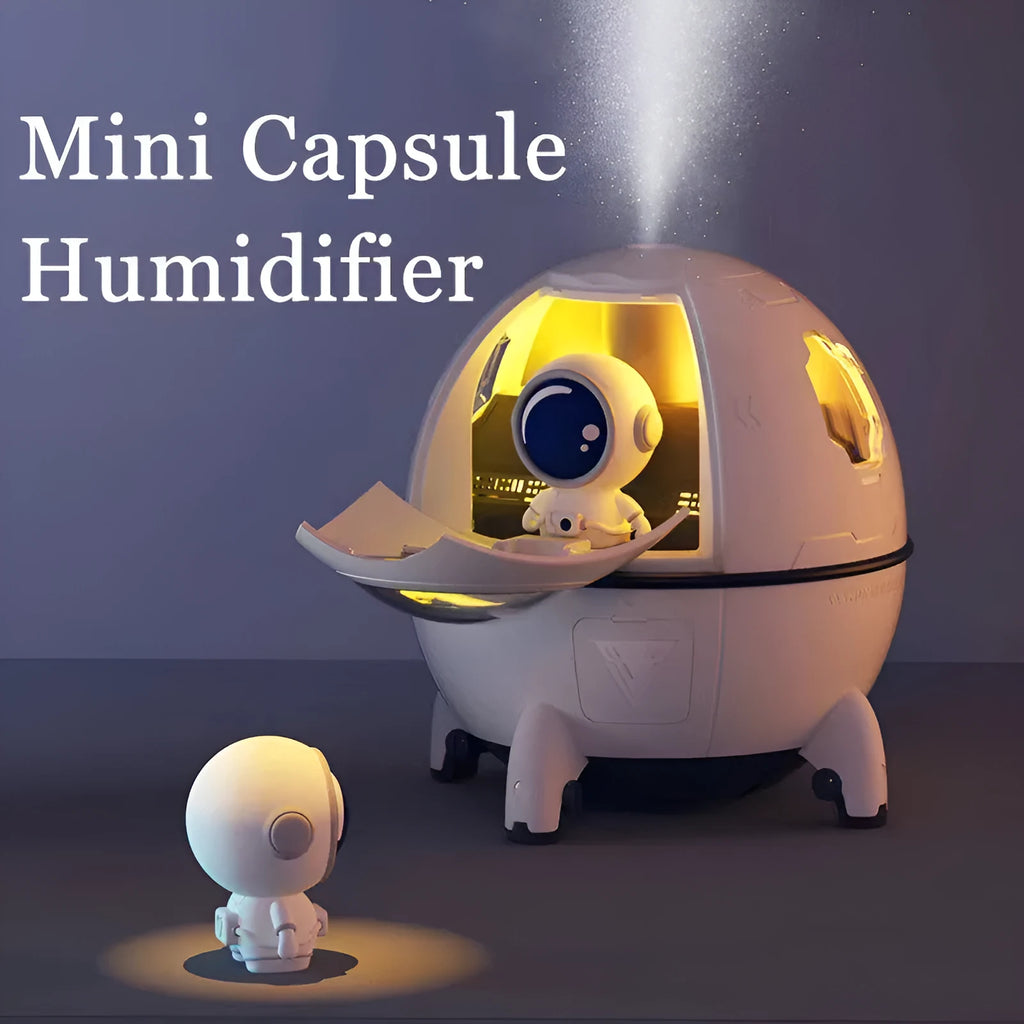 Purple astronaut-shaped USB desktop humidifier with colourful LED light on