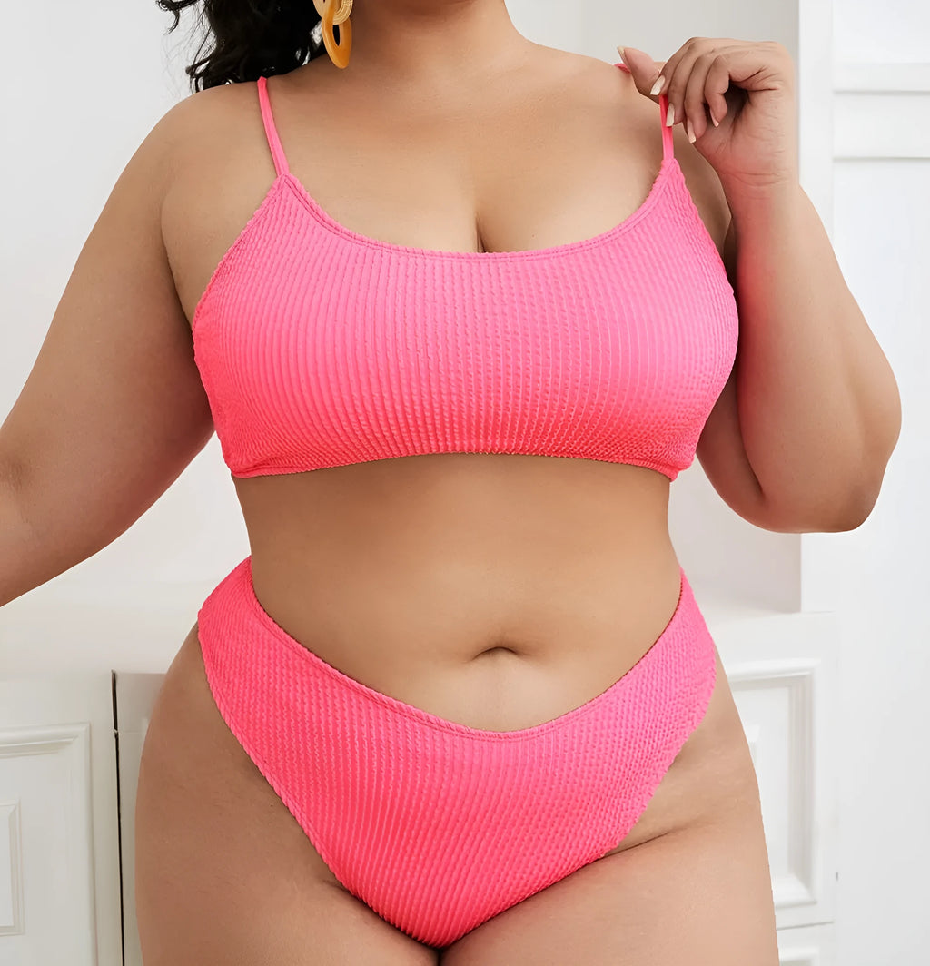 Plus-size pink two-piece bikini swimsuit with chest pad, sizes L to 4XL, 82% polyester