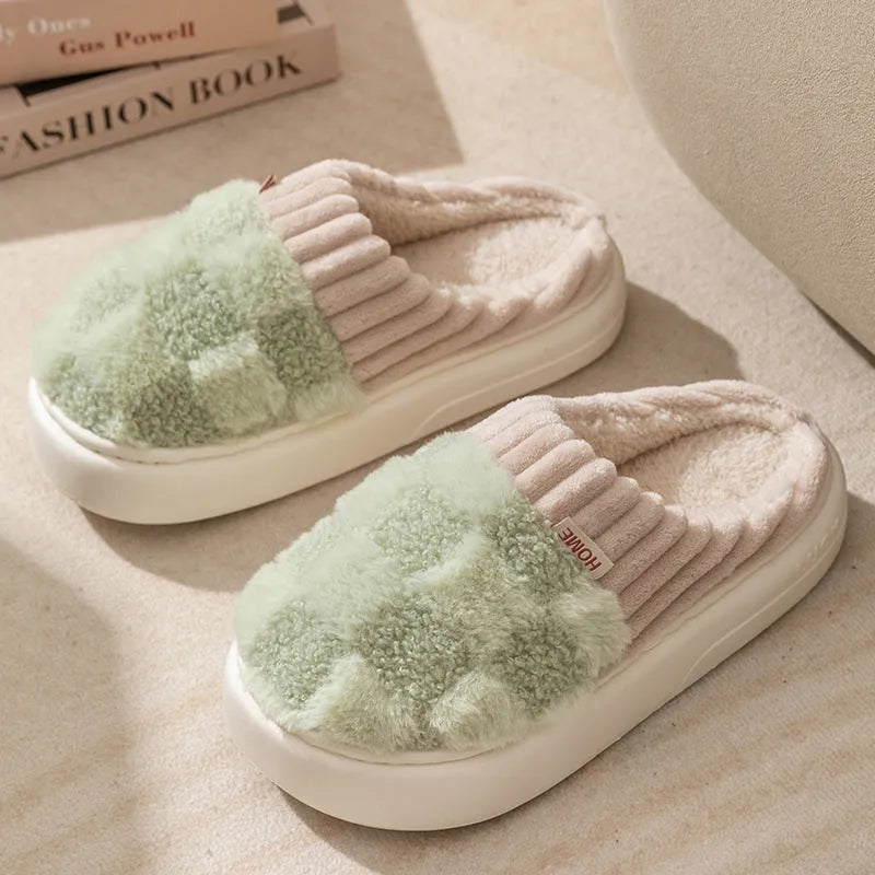 Women's plush round-toe slippers in grey, showing car suture detail and a flat PVC sole.