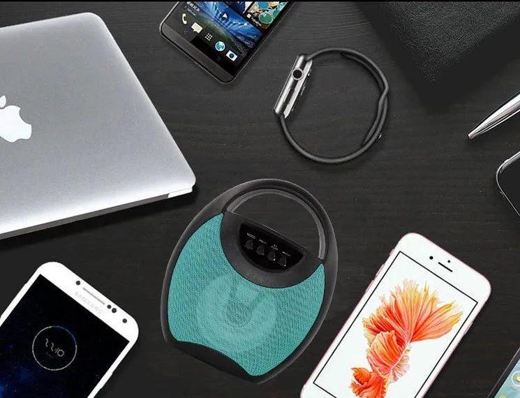 Portable Bluetooth speaker in black plastic casing with USB port and control buttons