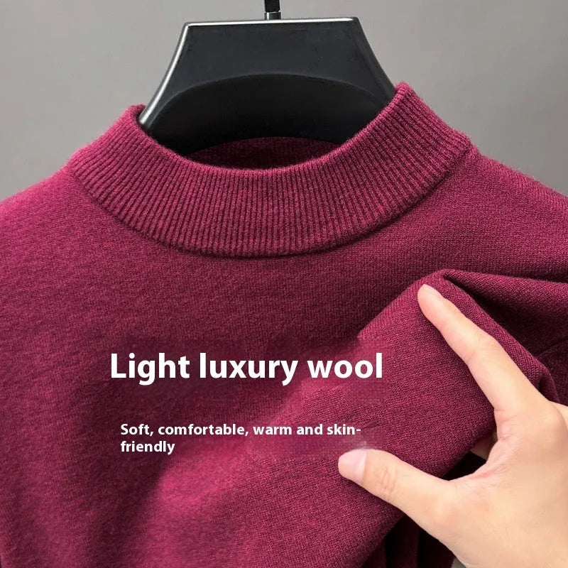 Men's fine wool half turtleneck sweater in a solid colour, showing long sleeves and regular fit.